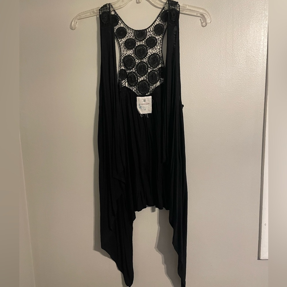 Women’s Black Vest- longer in front, shorter in back. Sequins and cute design